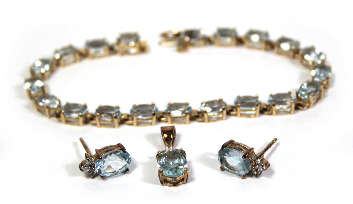 Lot 642 - A 14ct yellow gold tennis type bracelet set...