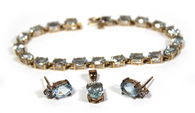 Lot 642 - A 14ct yellow gold tennis type bracelet set...