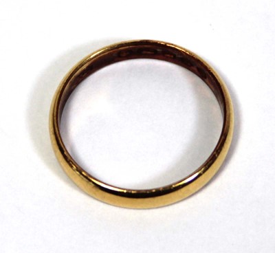 Lot 646 - A Victorian 22ct yellow gold wedding band,...