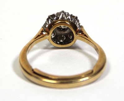 Lot 649 - A 9ct yellow gold cluster ring set brilliant...