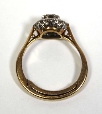 Lot 649 - A 9ct yellow gold cluster ring set brilliant...