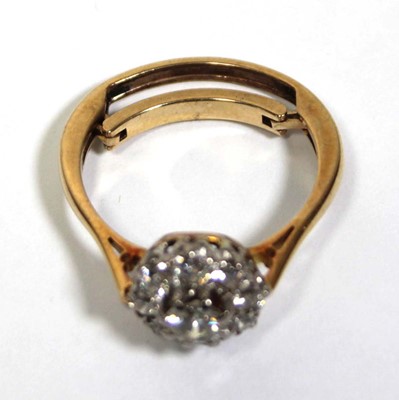 Lot 649 - A 9ct yellow gold cluster ring set brilliant...