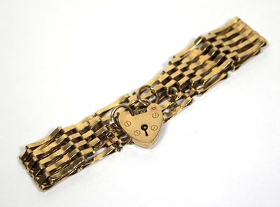 Lot 658 - A 9ct yellow gold five bar gatelink bracelet...