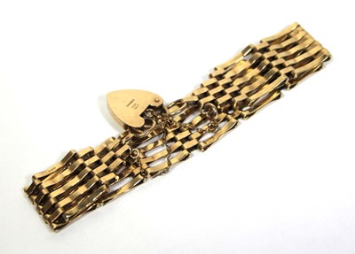 Lot 658 - A 9ct yellow gold five bar gatelink bracelet...