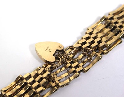 Lot 658 - A 9ct yellow gold five bar gatelink bracelet...