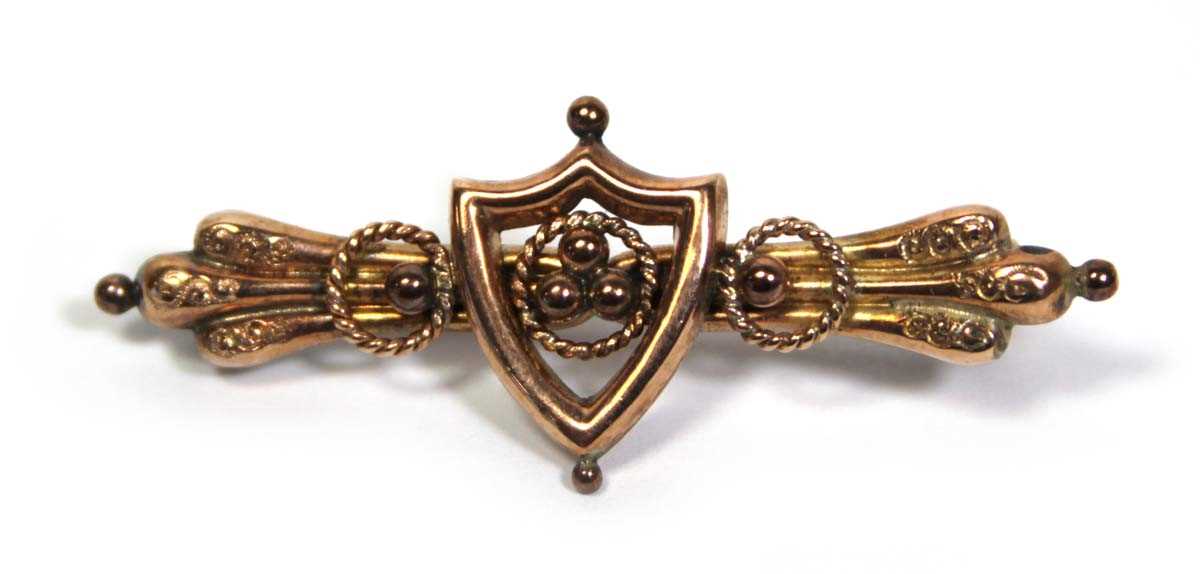 Lot 663 - A late Victorian 9ct yellow gold bar brooch of...