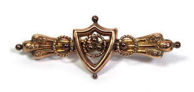 Lot 663 - A late Victorian 9ct yellow gold bar brooch of...