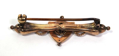 Lot 663 - A late Victorian 9ct yellow gold bar brooch of...