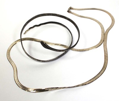 Lot 667 - A metalware and niellowork decorated slave...