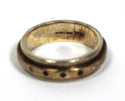 Lot 668 - A Harriet Kelsall 9ct yellow gold band ring...