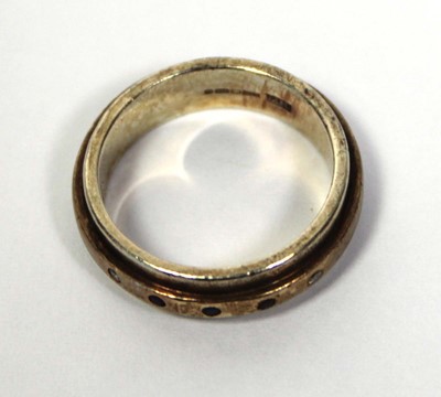 Lot 668 - A Harriet Kelsall 9ct yellow gold band ring...