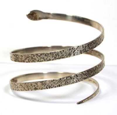 Lot 669 - A Harriet Kelsall hammered silver slave bangle...
