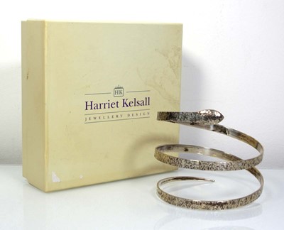 Lot 669 - A Harriet Kelsall hammered silver slave bangle...