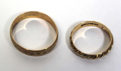 Lot 674 - Two 9ct yellow gold wedding bands, ring sizes...