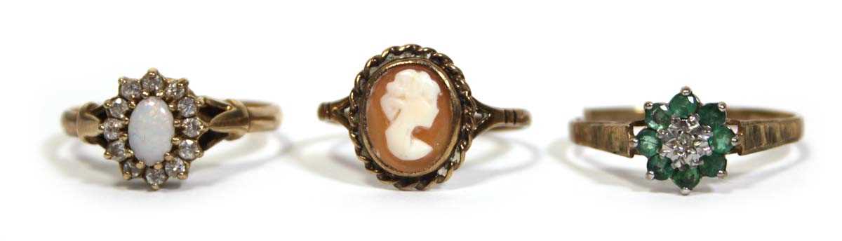 Lot 677 - Three 9ct yellow gold dress rings, one set...