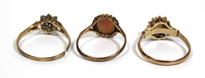 Lot 677 - Three 9ct yellow gold dress rings, one set...