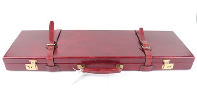 Lot 1357 - Red leather gun case, interior fitted for 30...