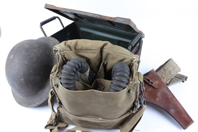 Lot 1139 - Metal ammunition tin of militaria including...
