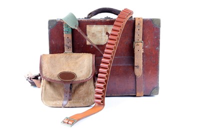 Lot 37 - An oak and leather cartridge magazine by...
