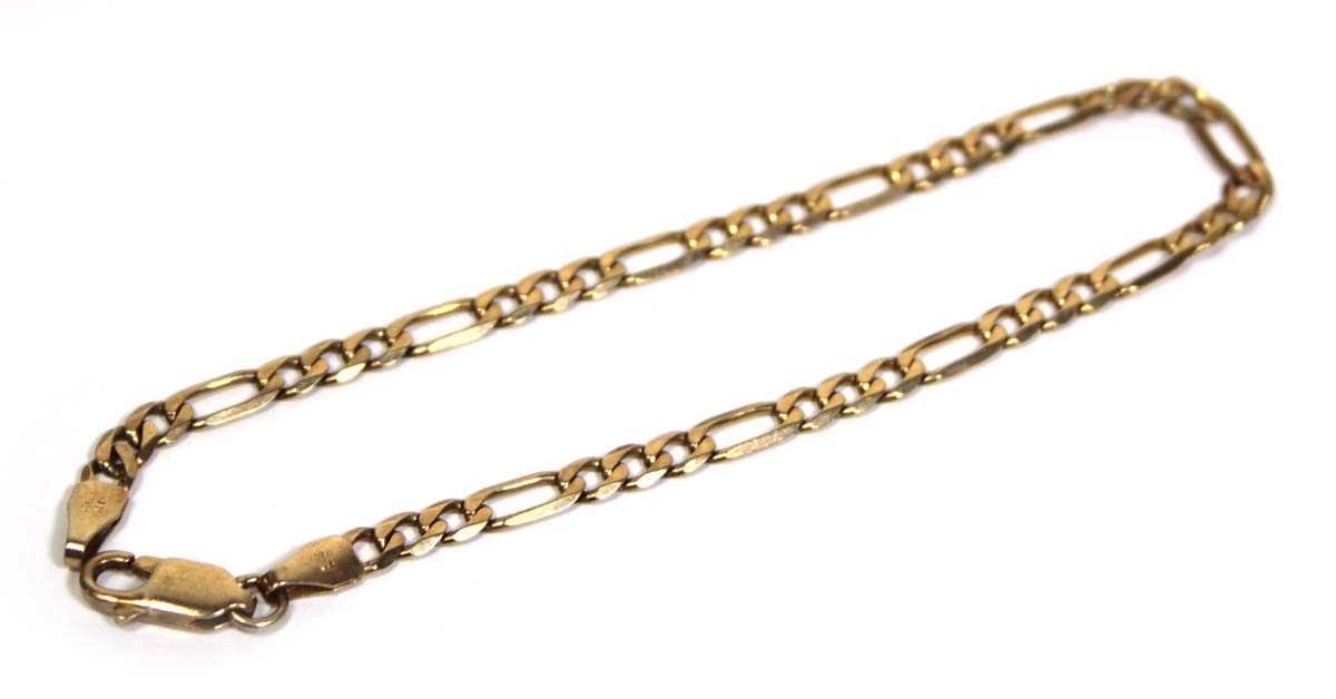 Lot 680 - A 9ct yellow gold figaro link bracelet with...