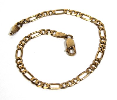 Lot 680 - A 9ct yellow gold figaro link bracelet with...