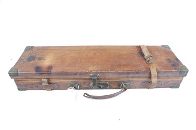 Lot 1467 - Oak and leather shotgun case, claret baize...