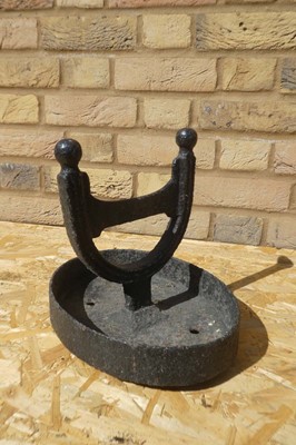 Lot A cast iron horse shoe shaped boot scrapper