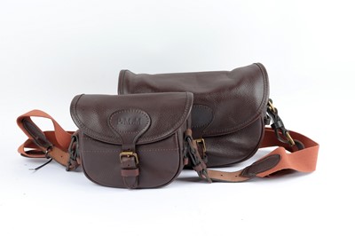 Lot 4 - A stepped set of two William & Son leather...
