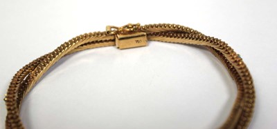 Lot 683 - An 18ct yellow gold double feather link...