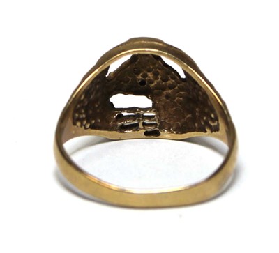 Lot 689 - A 9ct yellow gold ring modelled as a horses...