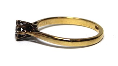 Lot 690 - An 18ct yellow gold ring set small diamond in...