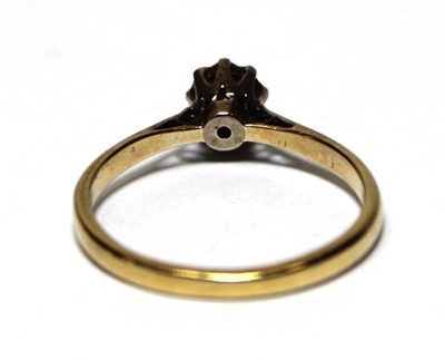 Lot 690 - An 18ct yellow gold ring set small diamond in...