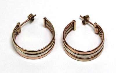 Lot 692 - A pair of 9ct tri-colour ear hoops, d. 2 cm, 3....