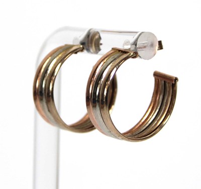 Lot 692 - A pair of 9ct tri-colour ear hoops, d. 2 cm, 3....