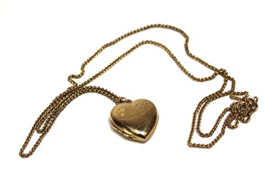 Lot 697 - A 9ct yellow gold finelink necklace suspending...