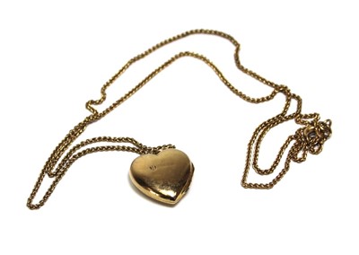 Lot 697 - A 9ct yellow gold finelink necklace suspending...