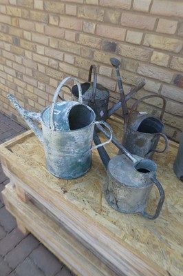 Lot 4 galvanised watering cans in Various sizes...