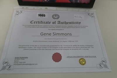 Lot 1005 - Signed photo of Gene Simmons from Kiss with COA