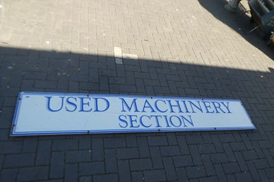 Lot Large advertisement sign "USED MACHINERY SECTION"