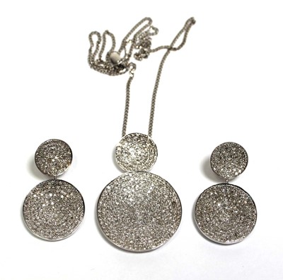 Lot 702 - A 9ct white gold flat curblink necklace...