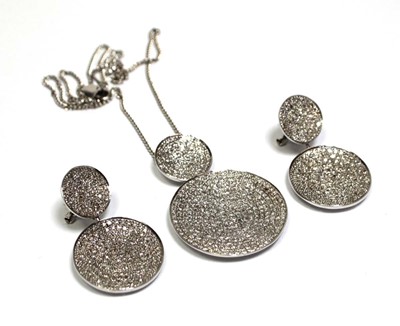 Lot 702 - A 9ct white gold flat curblink necklace...
