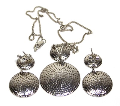 Lot 702 - A 9ct white gold flat curblink necklace...