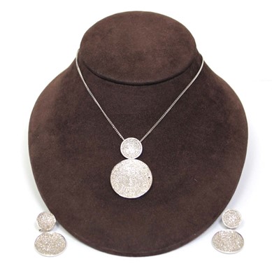 Lot 702 - A 9ct white gold flat curblink necklace...