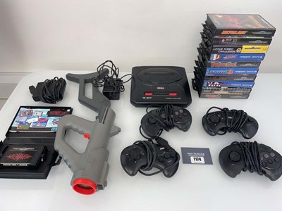 Lot 1174 - Sega Mega Drive with games and accessories to...