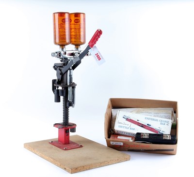 Lot 2406 - 12 bore MEC reloading press with box of misc....
