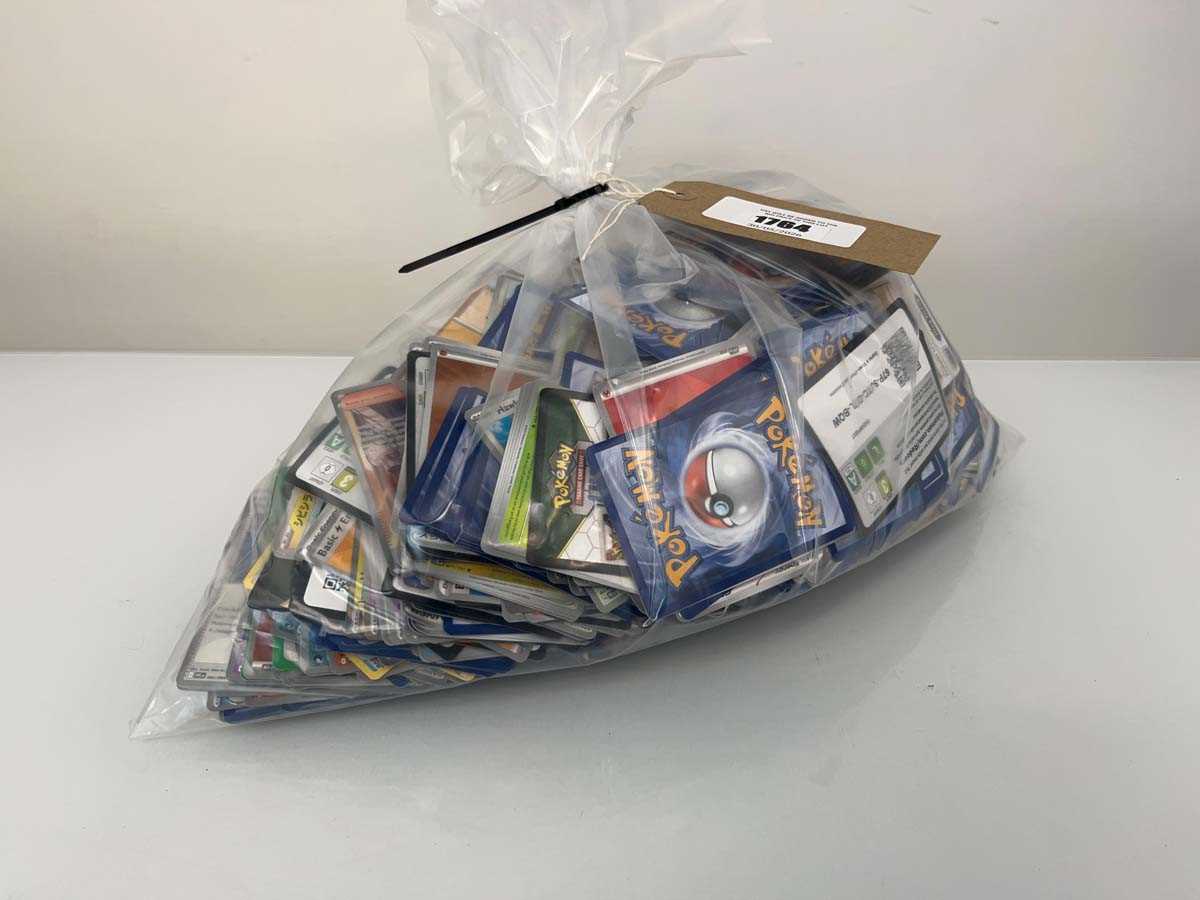 Lot 1764 - Bag containing a quantity of loose Pokémon TCG...