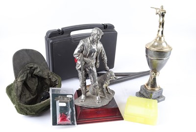 Lot 1185 - Box of shooting miscellany inc. trophies, hat,...