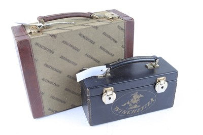 Lot 1382 - Two Winchester cartridge cases