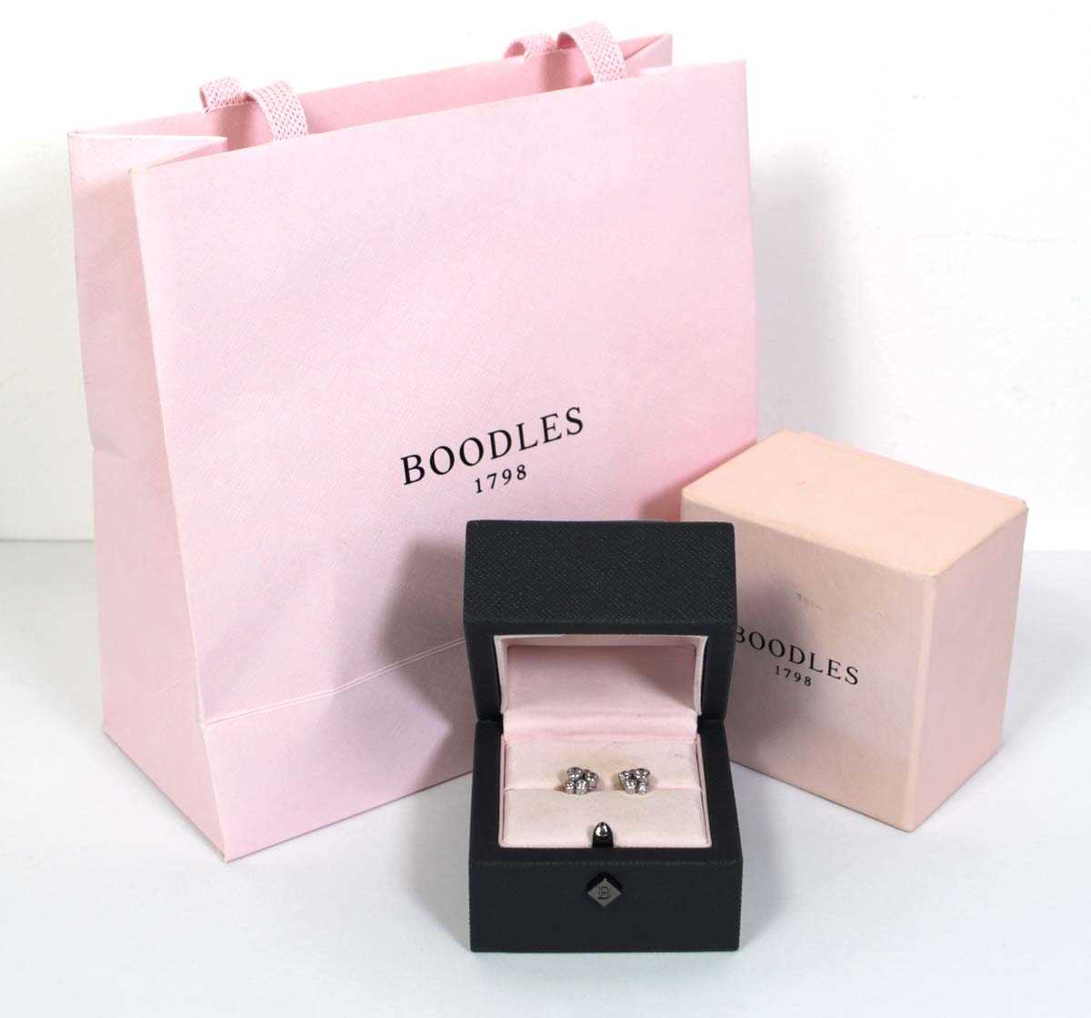 Lot 703 - A pair of platinium and diamond set 'Raindance'...