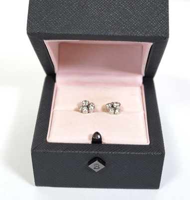 Lot 703 - A pair of platinium and diamond set 'Raindance'...